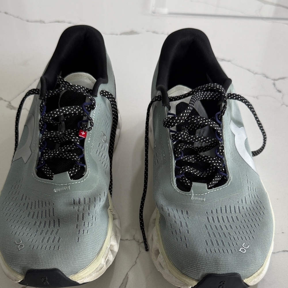 On Running Women’s Black and Gray Athletic Shoes
